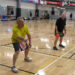 pickleball players in gym